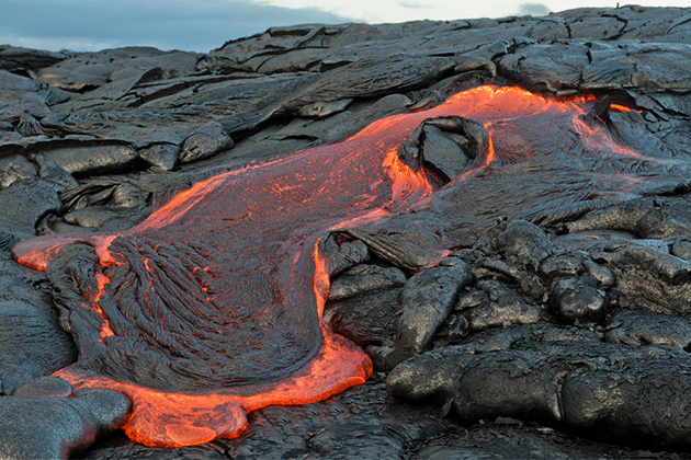 Flowing lava at Hawaii's Volcano National Park (photo: Robert Crow/Shutterstock) Hawaii Cruise Tips