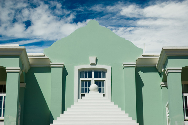 Pastel building in Hamilton, Bermuda (photo: Peter Rooney/Shutterstock) Transatlantic Cruise Tips