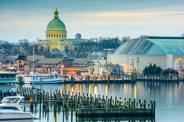 Annapolis Skyline with the US Naval Academy Chapel Dome (Photo: Sean Pavone/ Shutterstock) Annapolis, Maryland, USA town skyline at Chesapeake Bay with the United States Naval Academy Chapel dome.