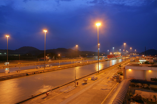 Panama Canal at night (Photo: Maria Maarbes/Shutterstock) View of Panama Canal at night from ashore