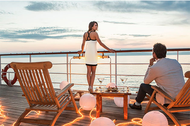 Couple on Club Med 2 Deck (Photo: Club Med) Couple Enjoying a Cocktail on Club Med 2 ship in the Caribbean Islands