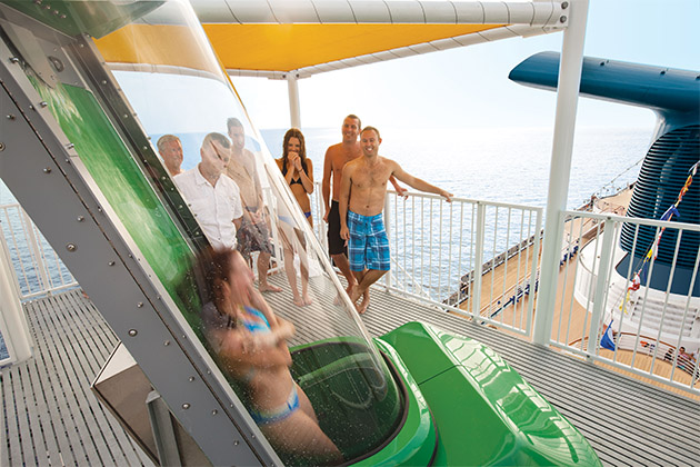 Green Thunder on Carnival Spirit (Photo: Carnival) Woman going down the Green Thunder waterslide on Carnival Spirit