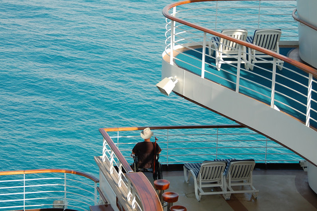 Disabled passenger on a cruise ship. (photo Ivan Cholakov/Shutterstock) Disabled passenger on a cruise ship.