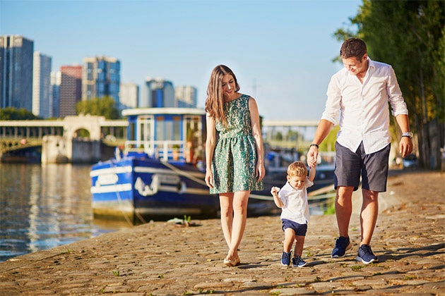 Family in Paris (Photo: Ekaterina Pokrovsky/Shutterstock) Family of three ambling along the cobblestone streets of Paris