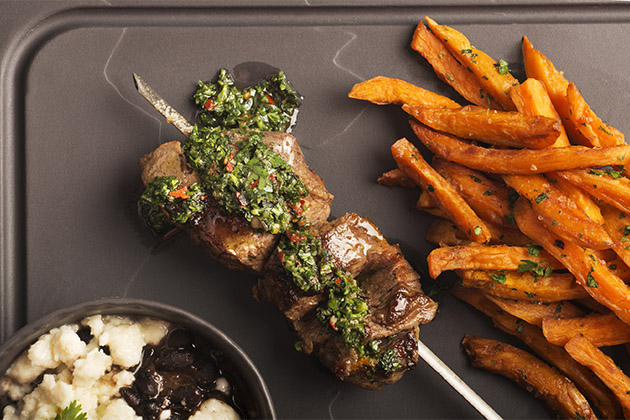 Dinner entree from Tastes on Crystal Serenity (Photo: Crystal Cruises) Steak kebabs and sweet potato fries from Crystal Serenity's evening menu