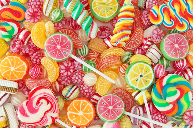 Arrange an In-Cabin Surprise (Photo: Elena Schweitzer/ Shutterstock) Mixed colorful fruit bonbon close up