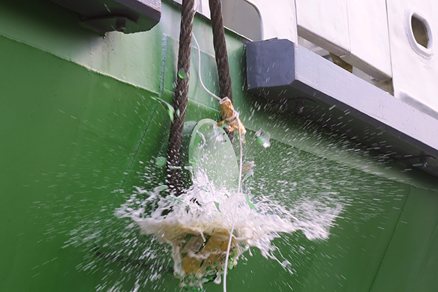 Smashing Champagne Against the Bow (Photo: Semen Lixodeev/ Shutterstock) Champagne smashed against the bow of a ship