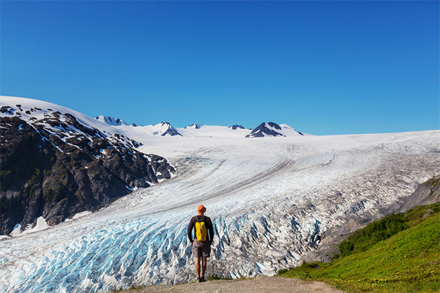 Exit Glacier (Photo: Galyna Andrushko/Shutterstock.com) Hiker in Exit Glacier, Kenai Fjords National Park, Seward, Alaska