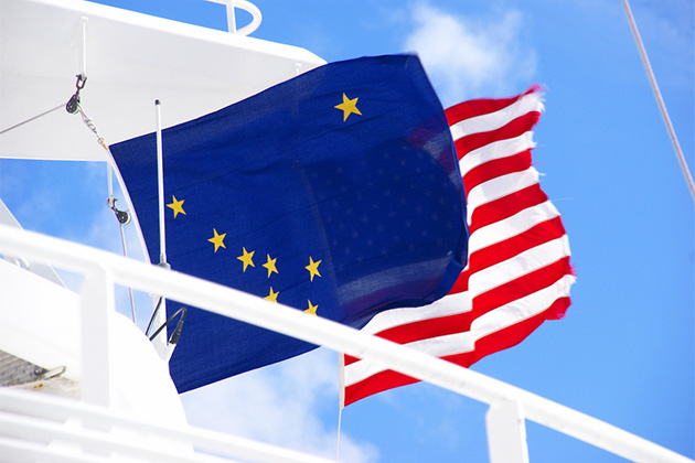 Alaskan and American flags waving from a cruise ship (Photo: steve estvanik/Shutterstock.com) Alaskan and American flags waving from cruise ship, Juneau, Alaska