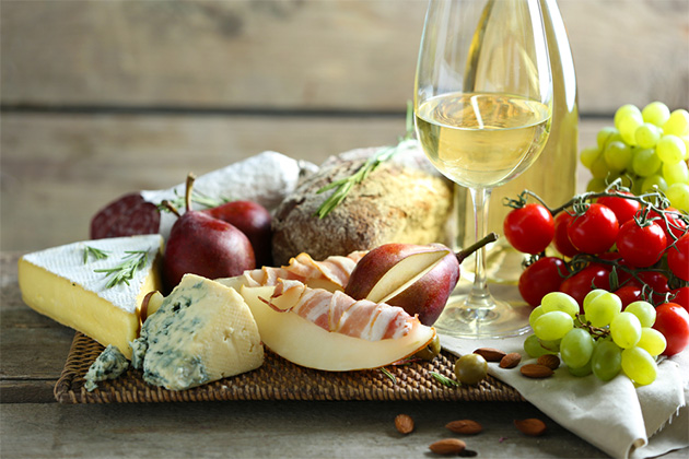 Wine and cheese tasting (Photo: Africa Studio/Shutterstock.com) Still life with various types of Italian food and wine