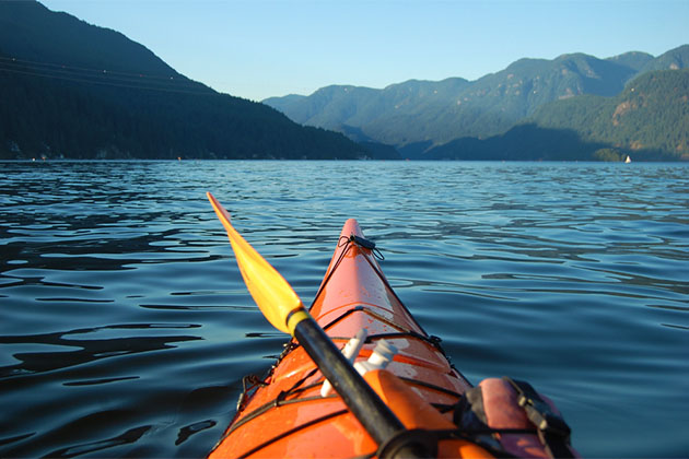 Kayaking Indian Arm (Photo: Swamis/Shutterstock.com) View of Indian Arm from a kayaker's perspective
