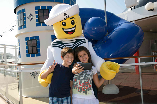 Kids with a Lego character on MSC Cruises (Photo: MSC Cruises) Two kids taking a selfie with a Lego character on MSC Cruises