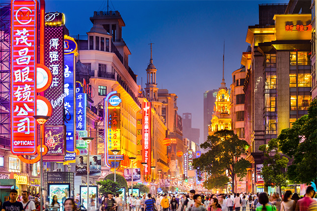 Famous shopping strip in Shanghai (Photo: ESB Professional/Shutterstock.com) Brightly lit street in Shanghai