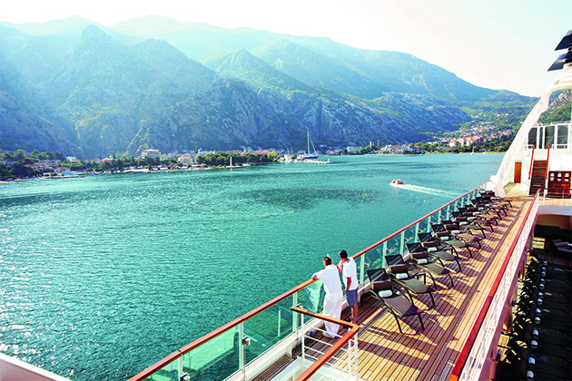 Seabourn at sea (Photo: Seabourn Cruise Line) View of sea and mountains from Seabourn pool deck