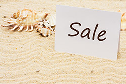 Watch for sales - photo courtesy of karen roach/Shutterstock vacation sale