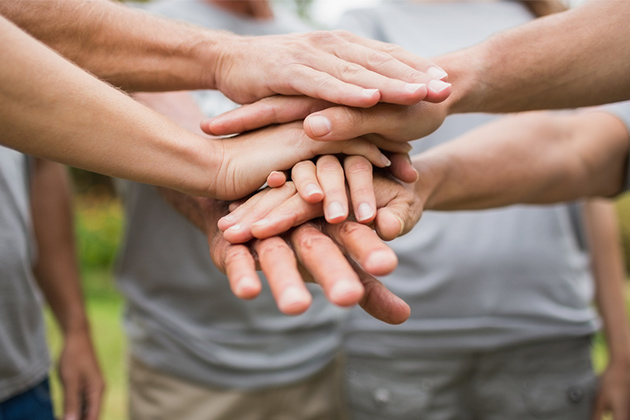 Give back in port and at sea with voluntourism (photo: wavebreakmedia) Group of volunteers