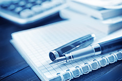 Figuring costs - photo compliments of Shutterstock Figuring costs