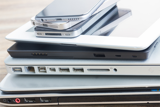 Because you need all of these things (photo: Neirfy/Shutterstock) Pile of electronic devices