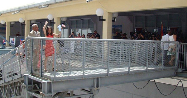 Tara Russel, Fathom's president celebrates along with Carnival Corp. president and CEO Arnold Donald as they make their way off Adonia. (photo: Dori Saltzman) Tara Russel and Arnold Donald