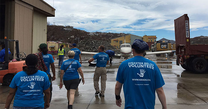 Norwegian Cruise Line Assists With Hurricane Relief (Photo: Norwegian Cruise Line) View of volunteers in island damaged by hurricane