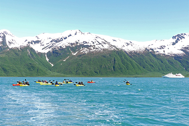 Windstar passengers kayaking in Alaska (Photo: Dori Saltzman/Cruise Critic) Passengers kayaking in Alaska, with mountains and Windstar ship in the background