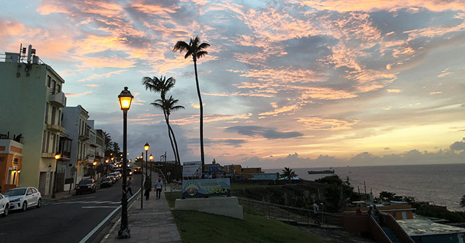 The sun setting over La Perla, a barrio in Old San Juan (Photo: Brittany Chrusciel) The sun setting over La Perla, a barrio in Old San Juan